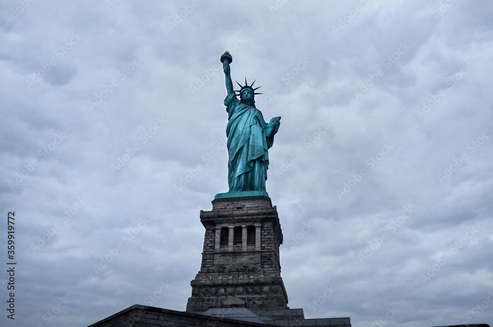 Fototapeta premium Statue of Liberty on the background of sky, New York City.