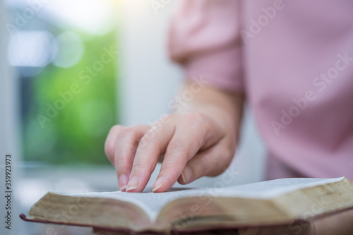 Women reading the Holy Bible.Reading a book.