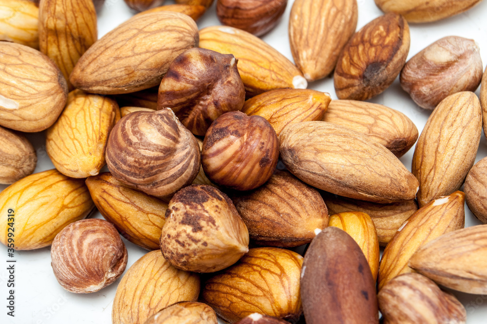 nuts in the dish. Hazelnuts and Almonds nuts in the dish. Hazelnuts and Almonds