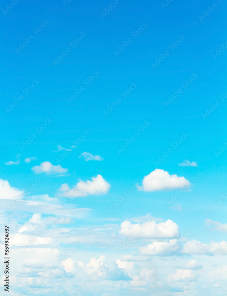 sky and clouds nature background,vertical sky,many clouds floating on colorful blue sky with sun light