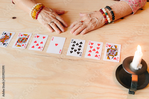 Guessing cards reading, grandma magic, fortune telling, women hands, destiny prediction