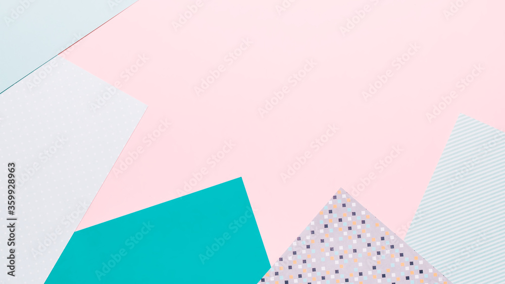 Paper geometric background in pink and mint green colors. Geometric shapes, minimalisctic backdrop with colored paper, frame, top view, copy space Paper geometric background in pink and mint green colors. Geometric shapes, minimalisctic backdrop with colored paper, frame, top view, copy space