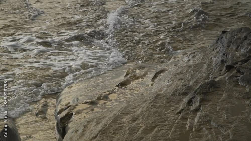 Slowmo, waves from both sides of the frame crashing into each other, low tide Slowmo, waves from both sides of the frame crashing into each other, low tide