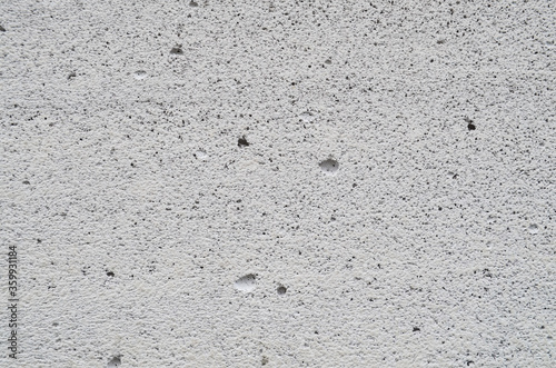 Light concrete wall background. Empty concrete wall with copy space. Concrete structure. Texture of old gray concrete wall for background. Close-up abstract gray background with place for text.