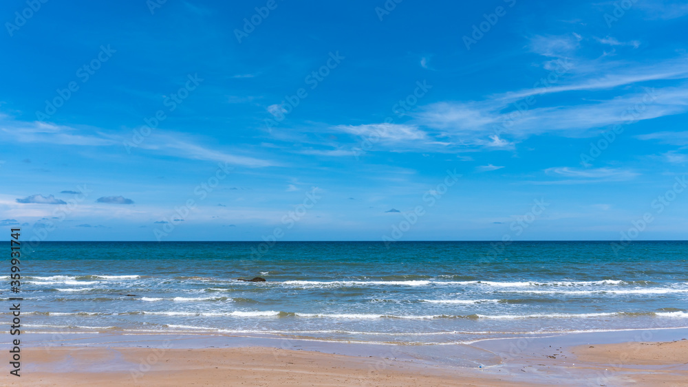 Tropical beach with gentle sea waves and cloudy skies In Chanthaburi province, Thailand, horizon, seascape, sea connect to the sky
