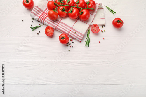 Red cherry tomatoes on kitchen napkin