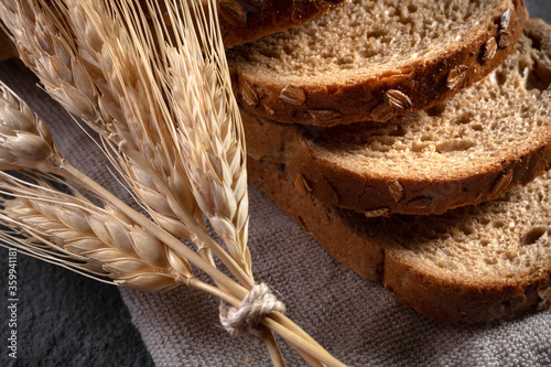 Grain and bread concept on stone background