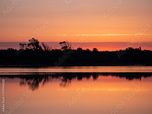 sunrise in the Salina dei Monaci Nature Reserve  an old salt pan at Torre Colimena  Taranto  Apulia  Italy