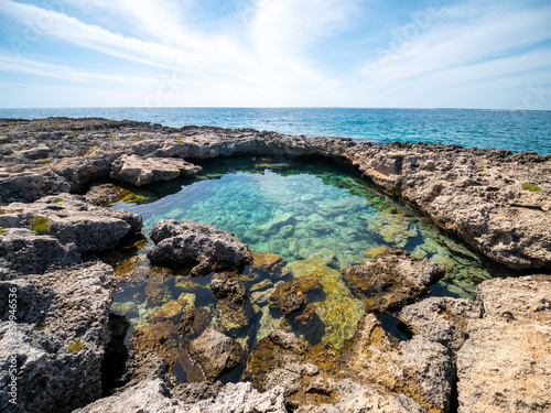 natural rock pool on the Ionian coast of Salento Palude del Capitano Nature Reserve  Nard    Salento  Lecce  Apulia  Italy