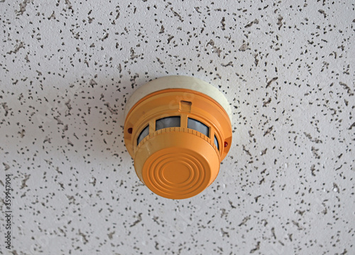 Smoke detector mounted on roof in hospital