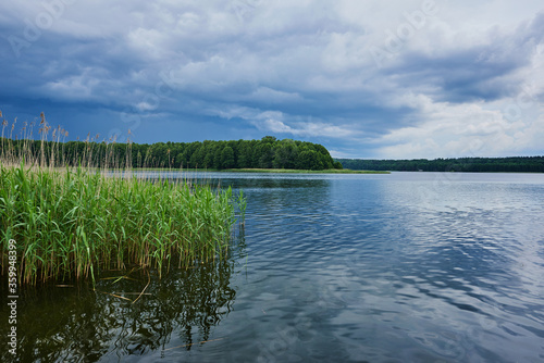 Beautifully cloudy sky over the lake in Warmia and Mazury