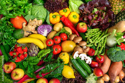 Pile of fruits and vegetables in many appetizing colors  shot from above  inviting to lead a healthy plant-based lifestyle and self-care