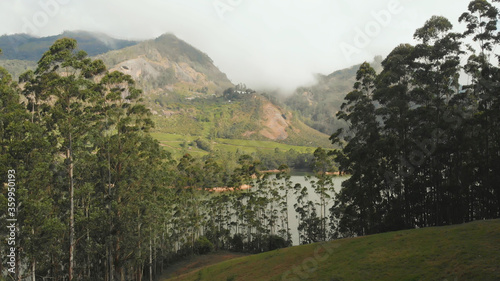 Aerial view beautiful nature with mountains and hills by Lake Mattupetty. Kerala State. Near the city of Munar. photo