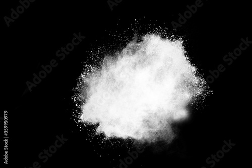 Fototapeta Naklejka Na Ścianę i Meble -  Freeze motion of white color powder exploding on dark background. 