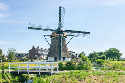 Traditional dutch windmill, now situated in a neighbourhood. Mill is named "Rijnenburgermolen".
