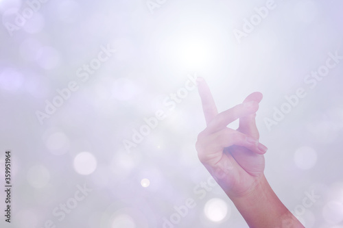 gesture of hand is show good idea snap finger isolated on bokeh background