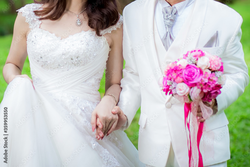 close up fashion of Evening dress of the bride and groom close up fashion of Evening dress of the bride and groom