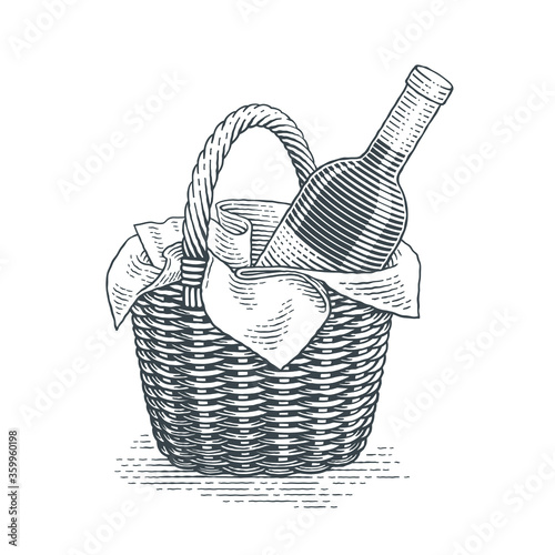 Wine bottle in a picnic basket. Hand drawn engraving style illustrations. 
