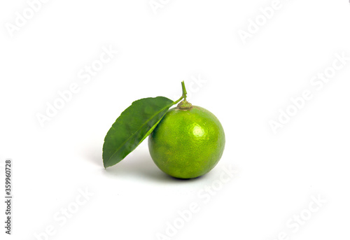 Lemon with green leaves isolated white background