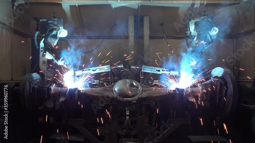 Automation welding mechanical procedure.,Industrial Robot arm active in factory