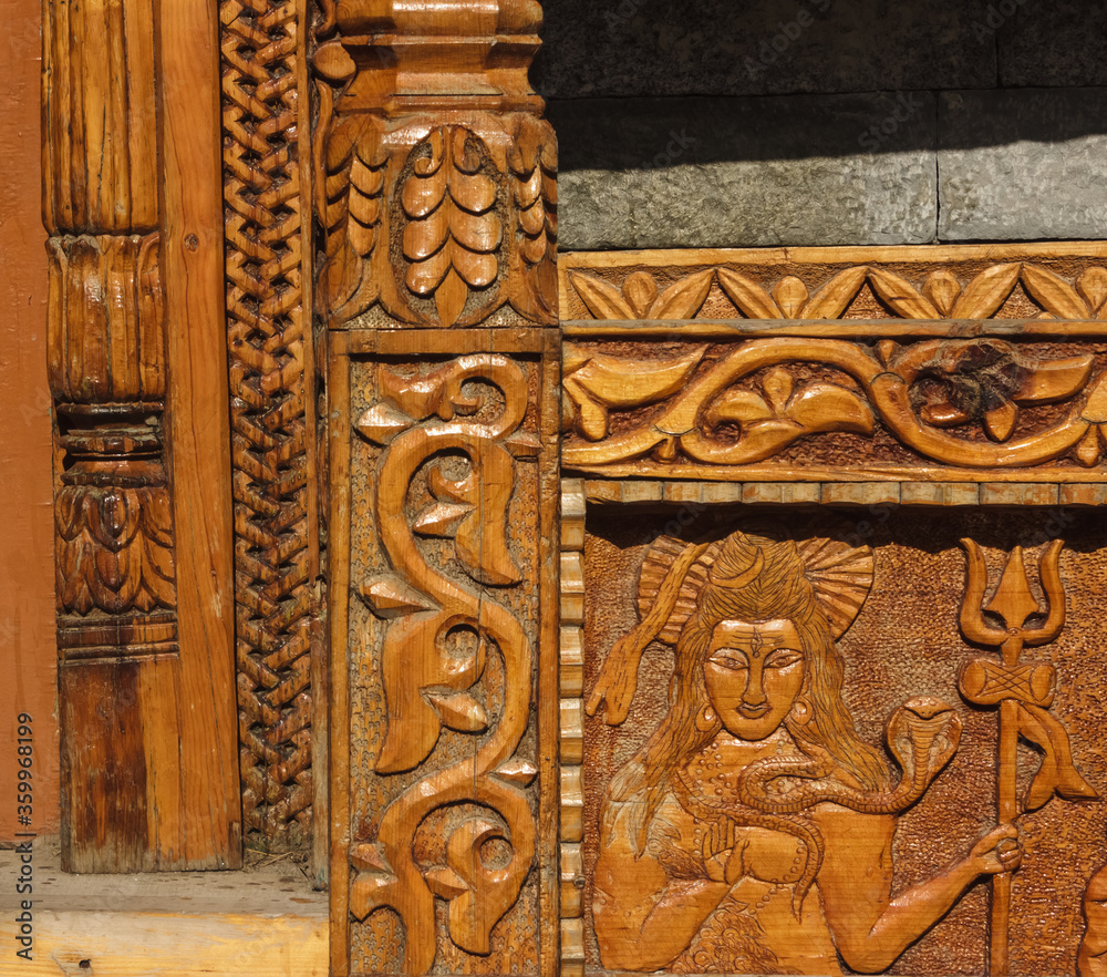 Wooden carvings on an ancient Hindu temple in the village of Kalpa in Himachal Pradesh, India.