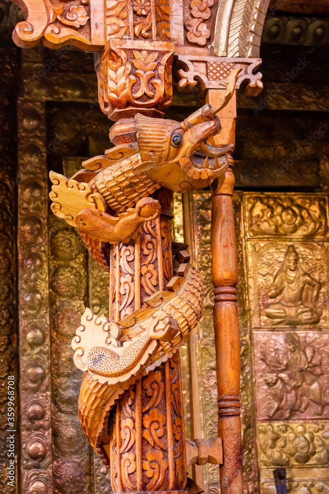 Fototapeta premium Wooden carvings in an ancient temple in the village of Kalpa in Kinnaur