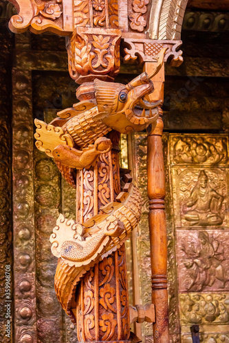 Wooden carvings in an ancient temple in the village of Kalpa in Kinnaur photo