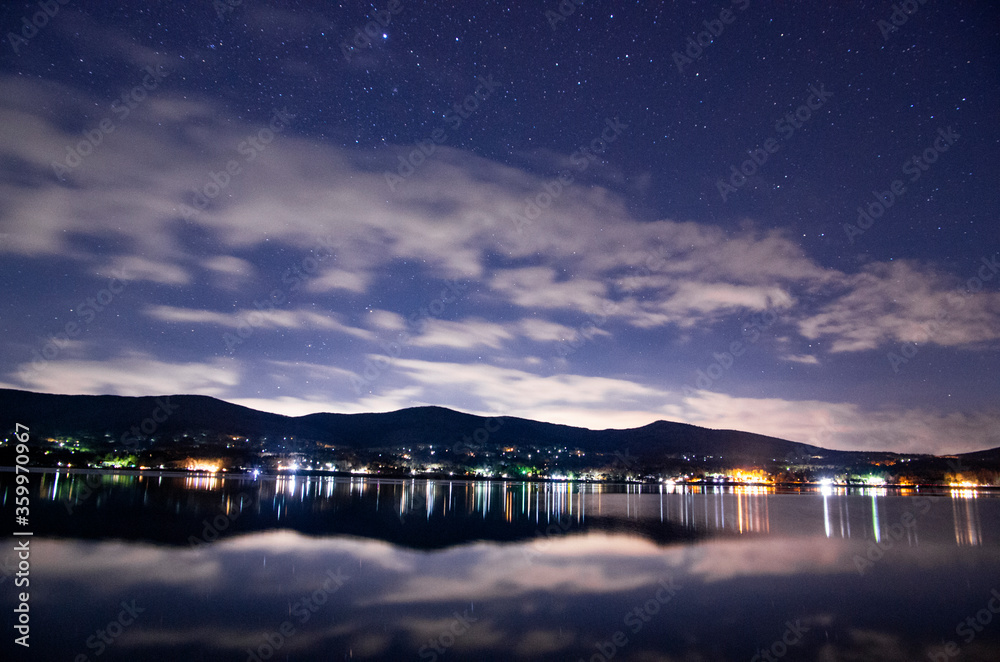Reflection from the water surface on a starry night, Lake Yamanaka, Japan