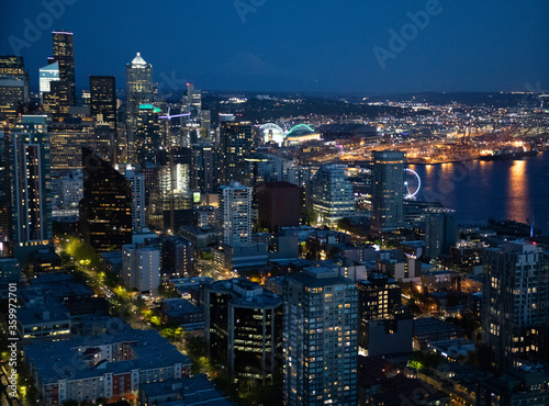City Lights and Downtown Seattle skyline cityscape as seen at night from the Space Needle.  