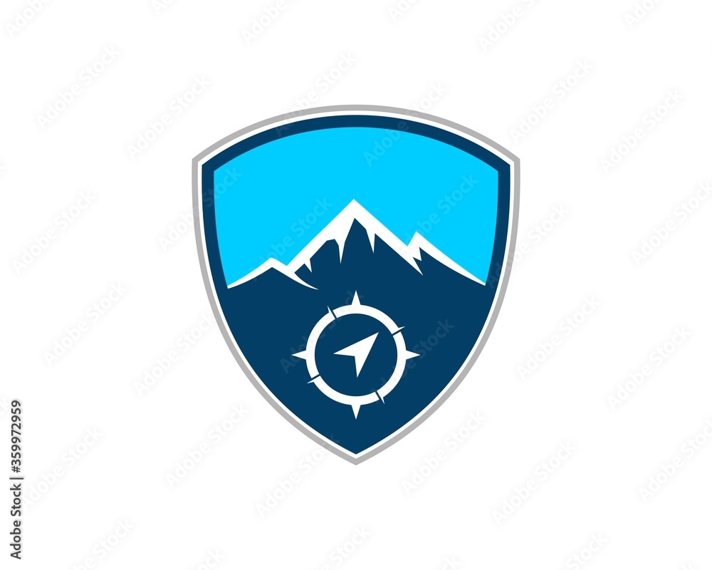 Shield with mountain and compass inside