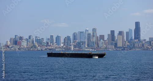 Large barge near the skyline of Seattle  Washington