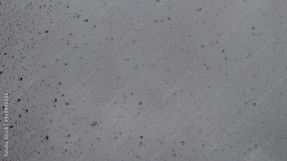 water drops on the window. Rain droplets, wet surface, water seal. Waterproof water drops on the window. Rain droplets, wet surface, water seal. Waterproof