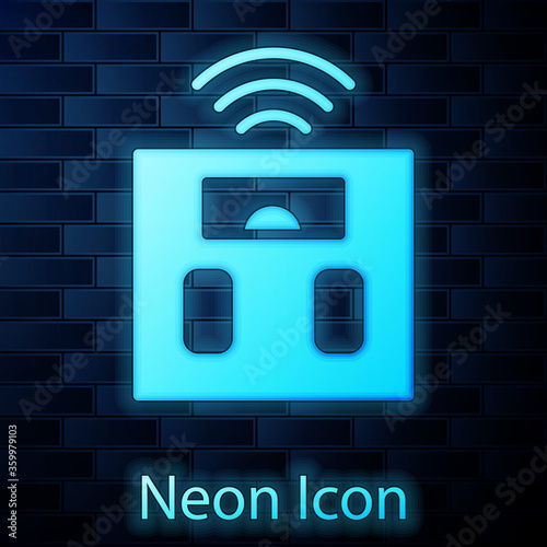 Glowing neon Smart bathroom scales icon isolated on brick wall background. Weight measure equipment. Internet of things concept with wireless connection.  Vector