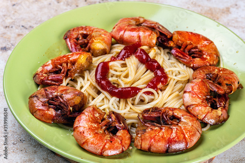 pasta with shrimp. traditional italian dish with shrimp. Home kitchen.