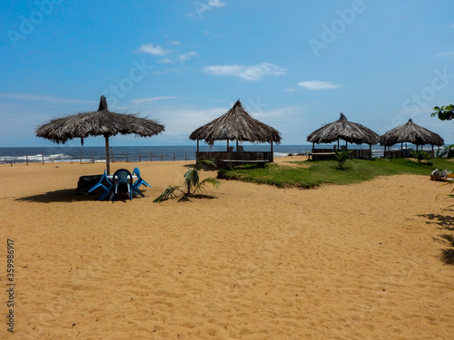 Atlantic Ocean beach, Monrovia, West Africa, Liberia,  Hotel "Africa" area, beach for local people, rest and picnic area. © Oleksandr