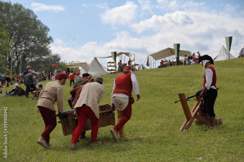 Medieval Festival: People Carrying Barrow