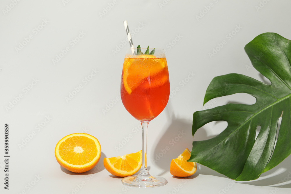 Composition with aperol spritz cocktail on white background. Summer drink
