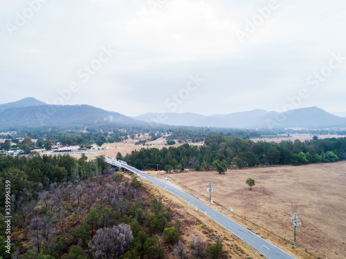 Bulga bridge and smoke filled sky over the hills and rural town photo