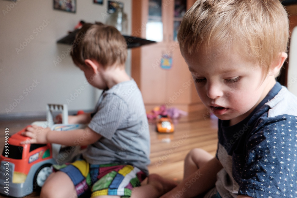 Boys Playing on the Floor