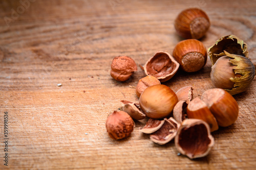 Hazelnut. Delicious hazelnuts on a wooden background.