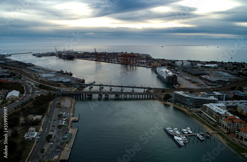 An aerial view of a water inlet and the surrounding port photo