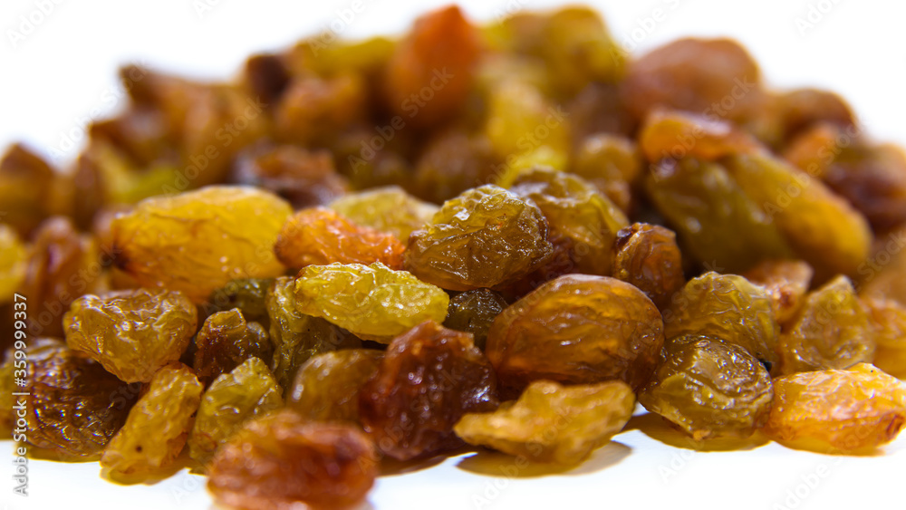 Dried Raisins isolated on a white background. Dried grape raisins Dried Raisins isolated on a white background. Dried grape raisins
