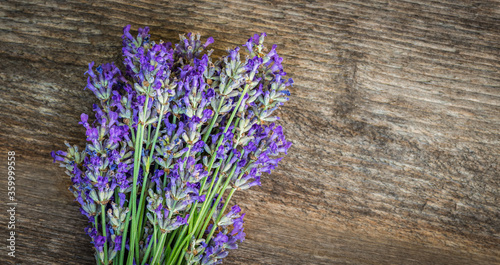 Lavender flowers on wooden background. Close up.