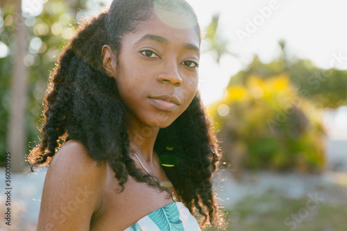 Portrait of a young confident black woman outdoors.