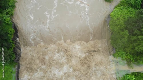 Disaster.Dirty water.Catastrophe.Fast flowing raging river.