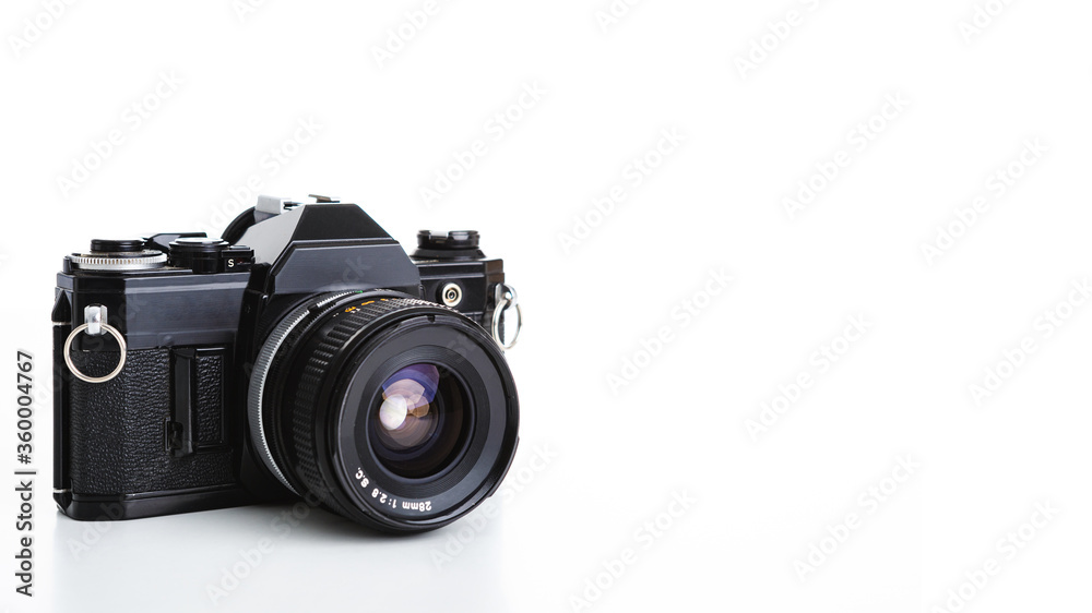 Black analogue camera. Isolated white background. Space for text