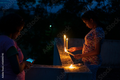 Teenage Girls enlightening candles