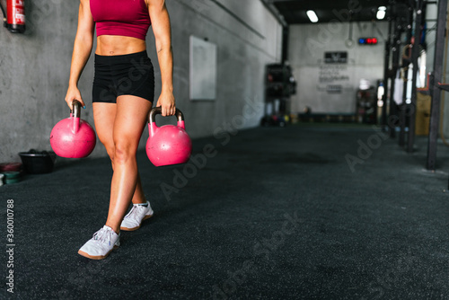 Close up Woman Exercise With Kettle Bell photo