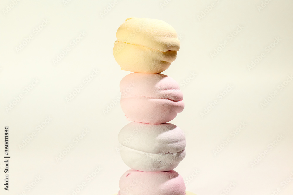 multi-colored marshmallow on the background of a close-up macro multi-colored marshmallow on the background of a close-up macro