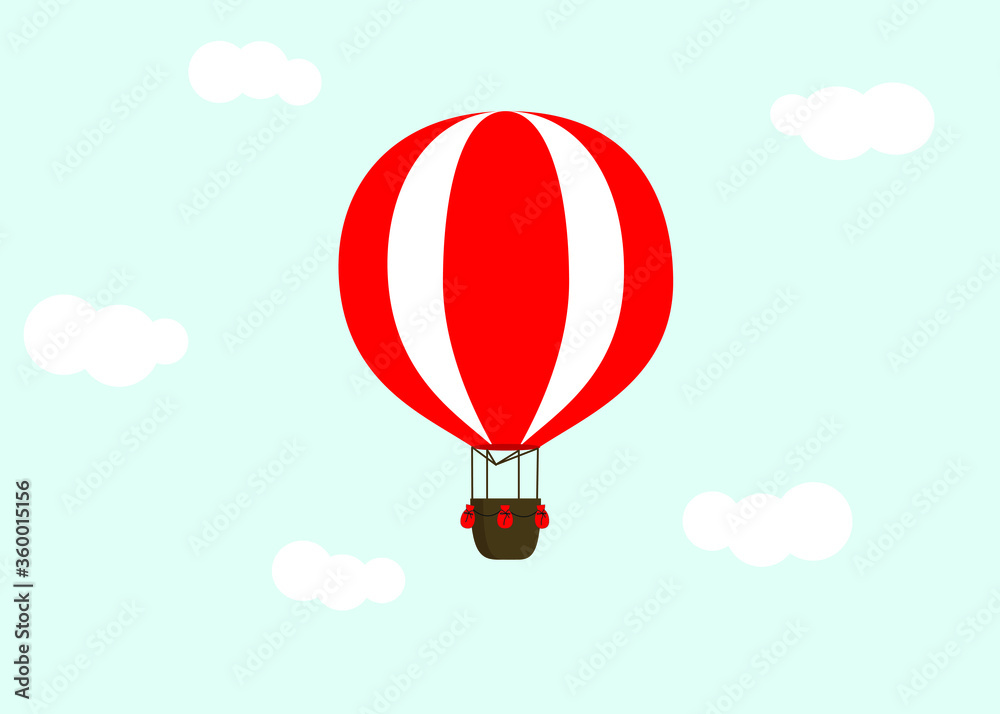 Fototapeta premium Red hot air balloon with clouds